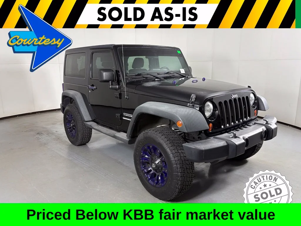 Used 2012 Black Jeep Sport image 1