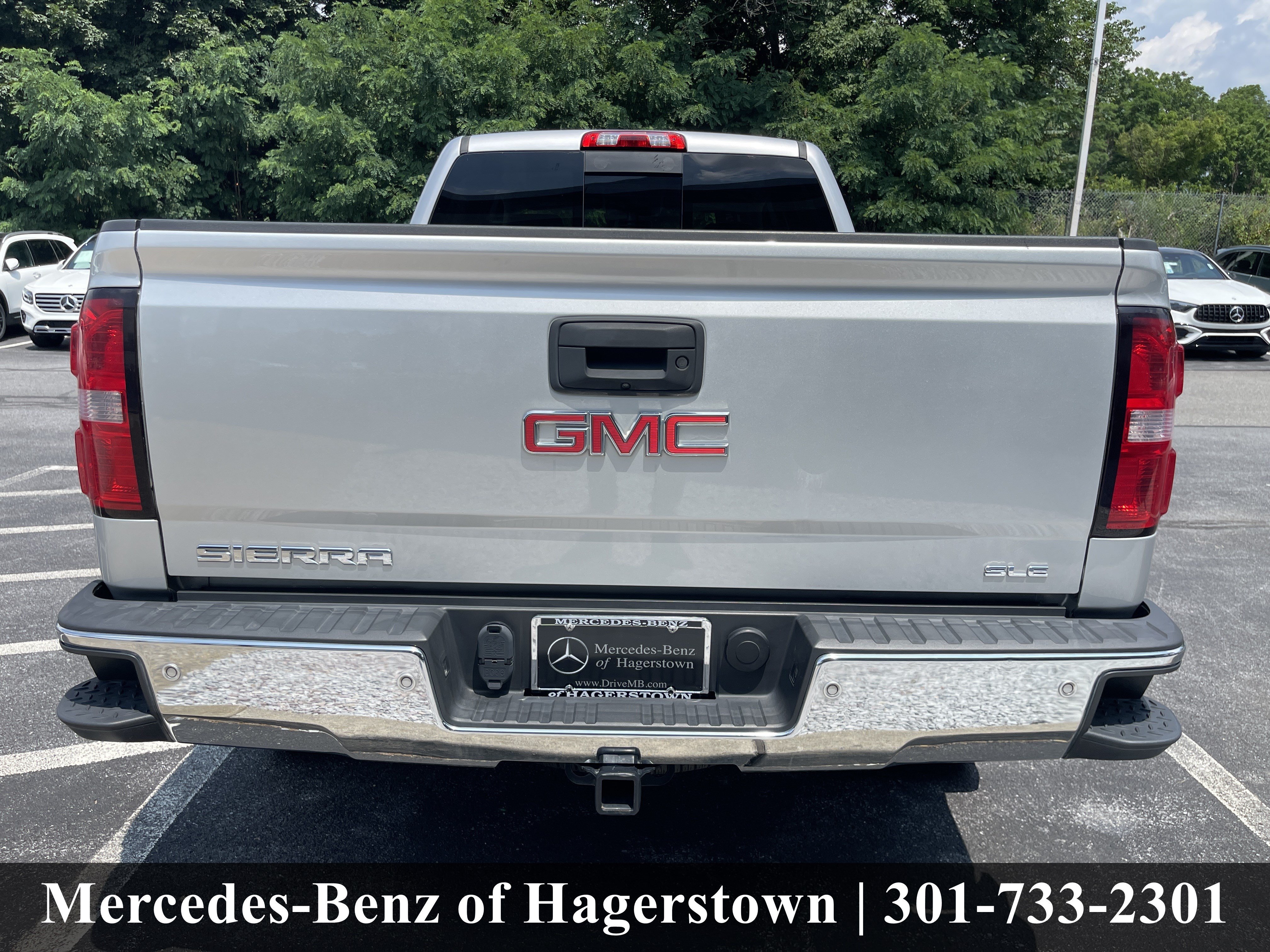 Used 2015 Quicksilver Metallic GMC SLE 4WD Crew Cab 153.0 image 31