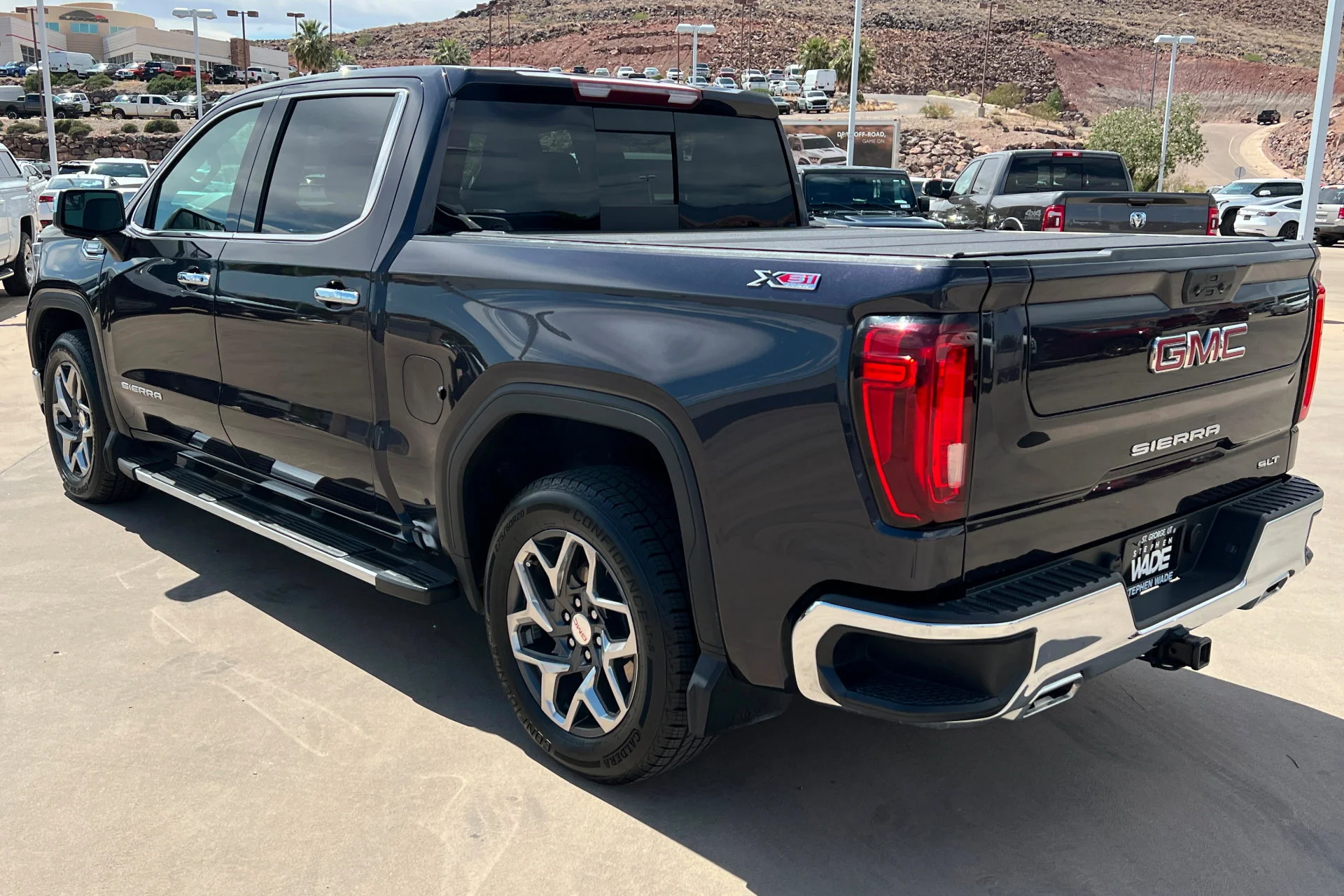Used 2023 Titanium Rush Metallic GMC SLT image 3