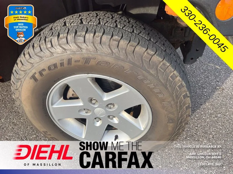 Used 2013 Orange Jeep Unlimited Sport image 7
