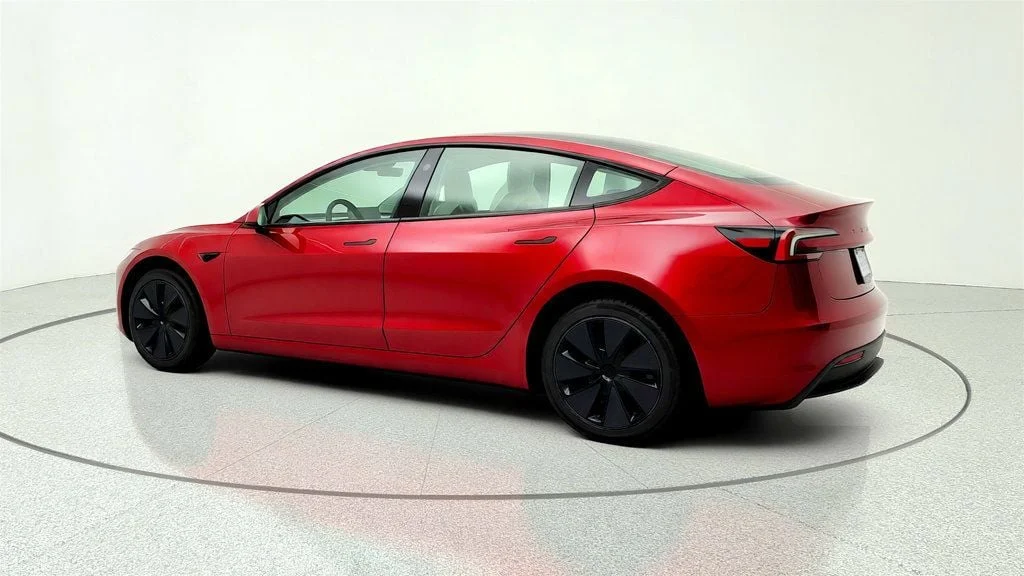 Used 2026 Ultra Red Tesla Long Range RWD w/ White & Black Premium Interior image 7
