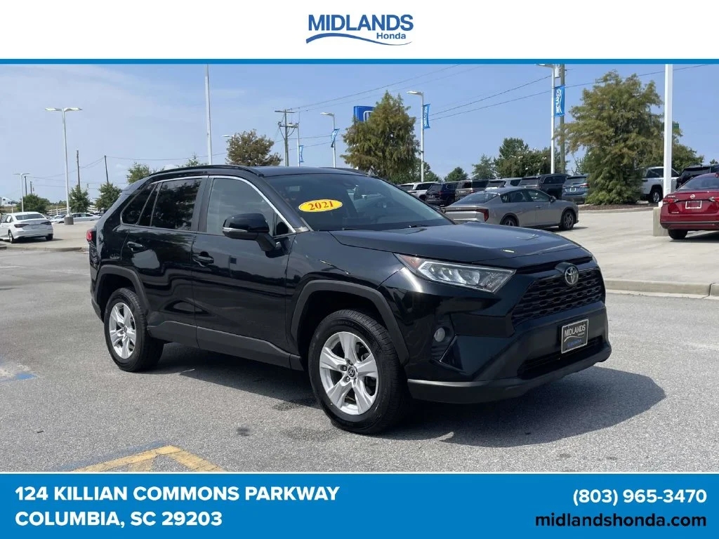 Used 2021 Midnight Black Metallic Toyota XLE image 1