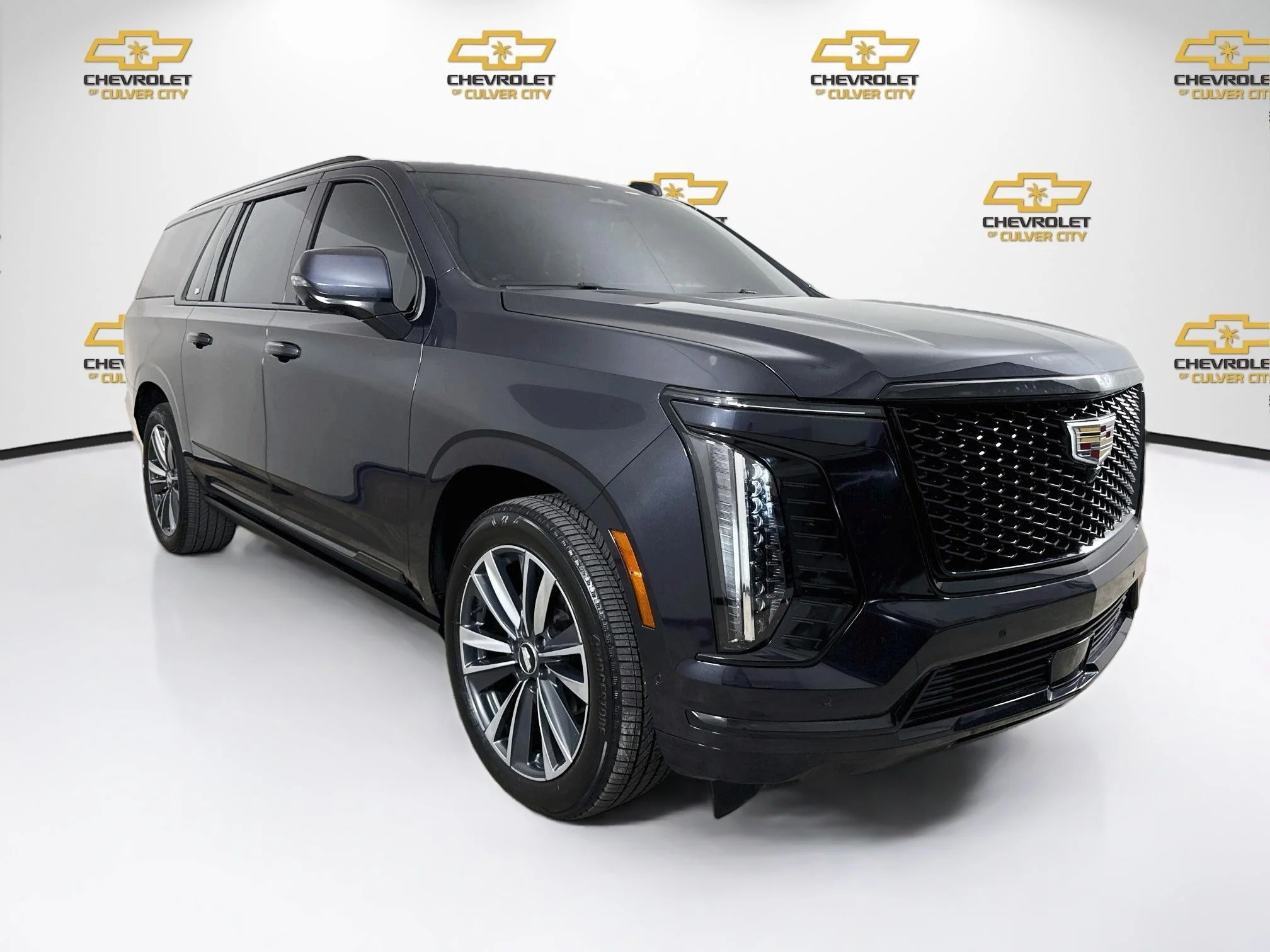 Used 2025 Galactic Gray Metallic Cadillac Sport image 1