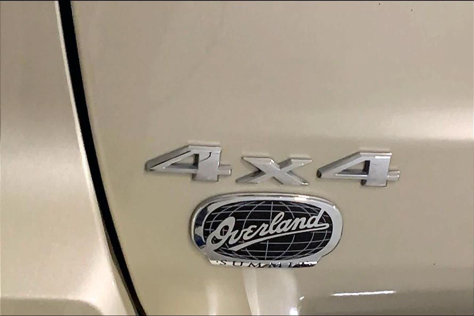 Used 2011 White Gold Jeep Overland Summit image 9