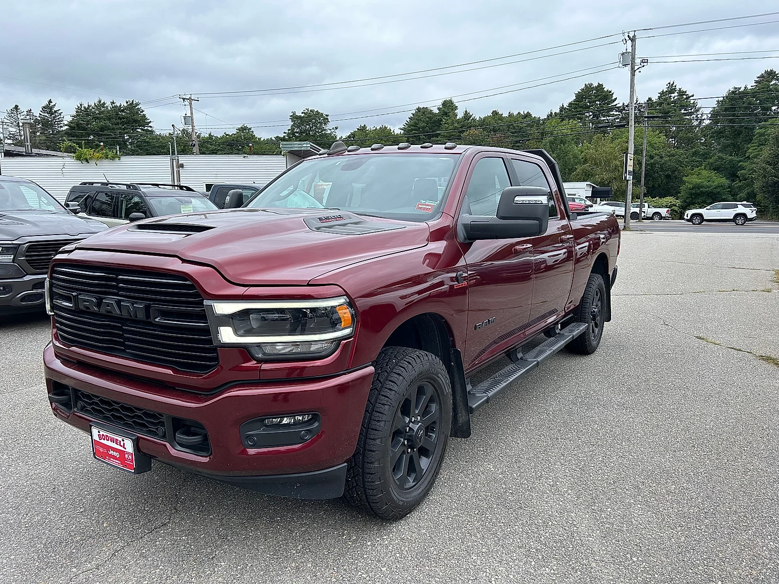 Used 2023 Delmonico Red Pearlcoat Ram Laramie Crew Cab 4x4 6