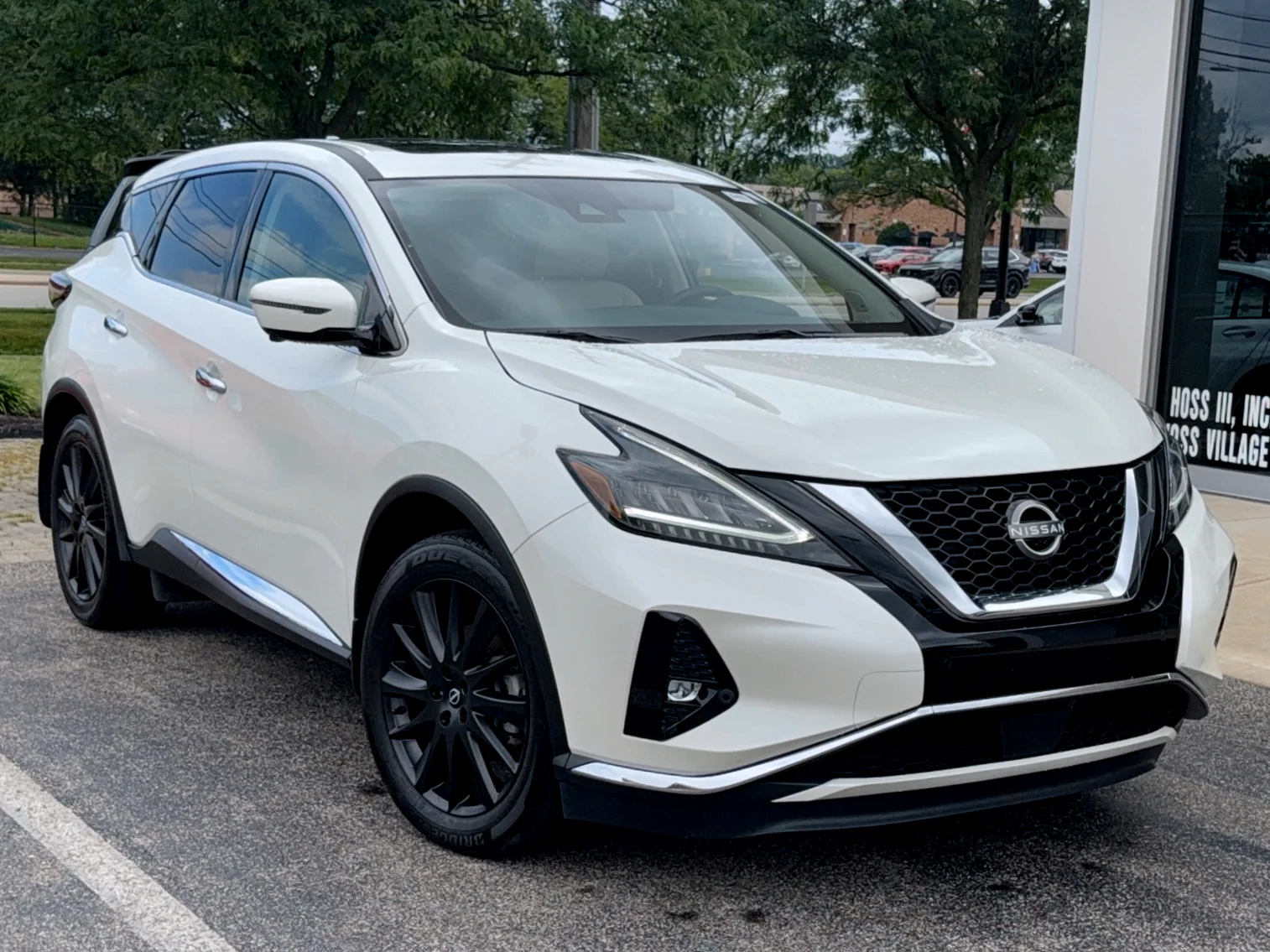 Used 2024 Pearl White TriCoat Nissan SL image 1