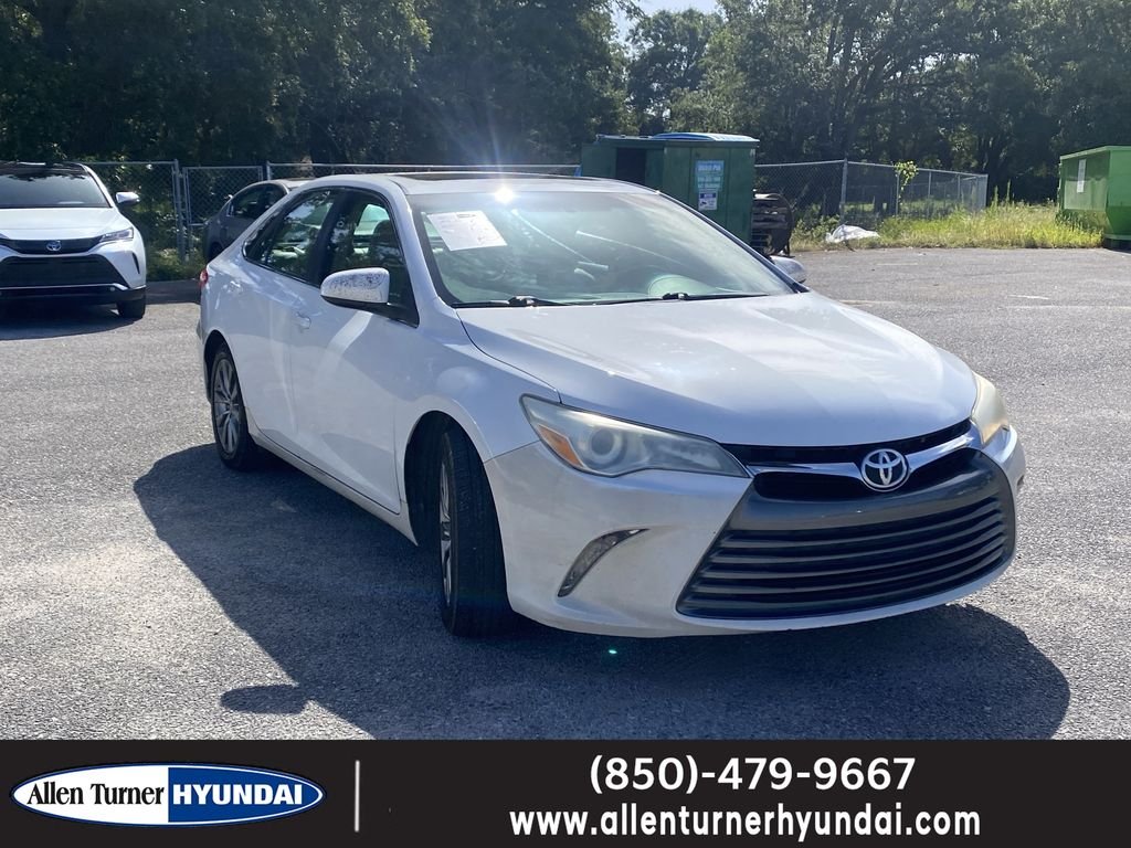 Used 2016 Super White Toyota XLE image 1
