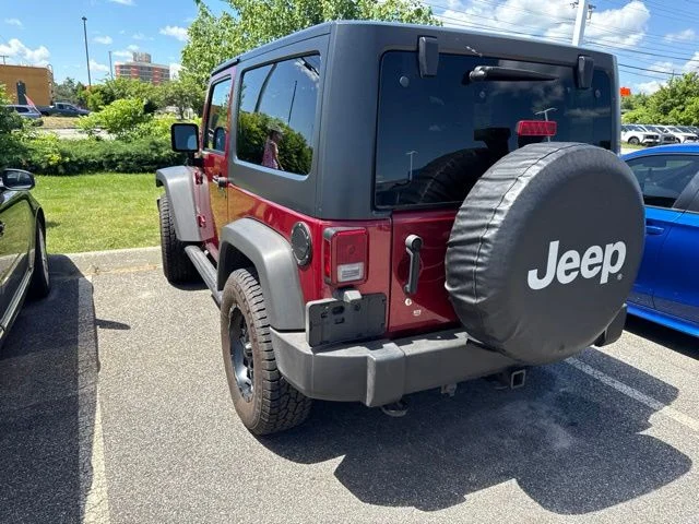 Used 2013 Deep Cherry Red Crystal Jeep Sport image 12