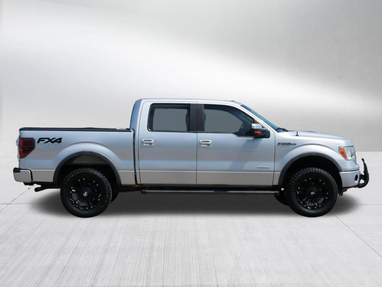 Used 2012 Ingot Silver Metallic Ford FX4 image 8