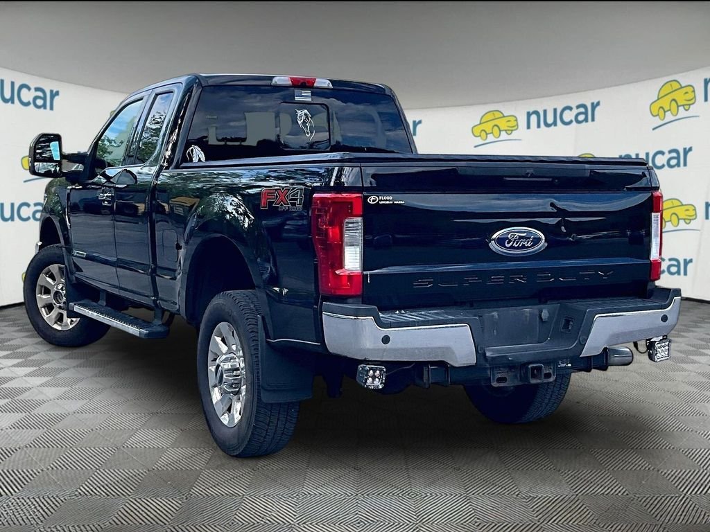 Used 2019 Black Metallic Ford Lariat image 4