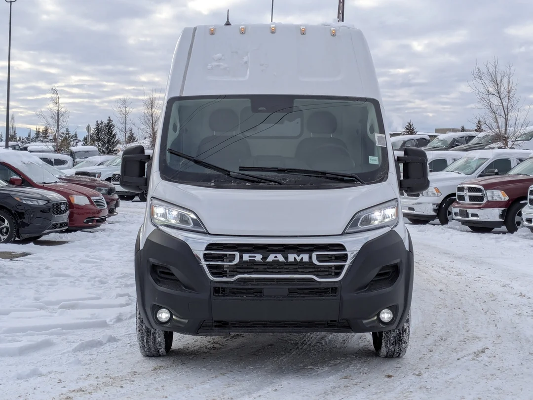 New 2026 White RAM SLT - - Super High Roof - Package 22G - LED Headlamps - Cargo Partition - Remote Start & More! image 3