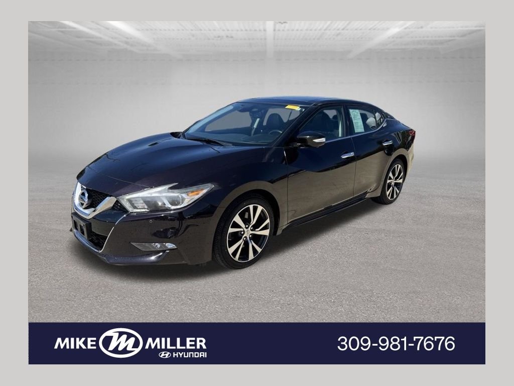Used 2016 Bordeaux Nissan Platinum image 1