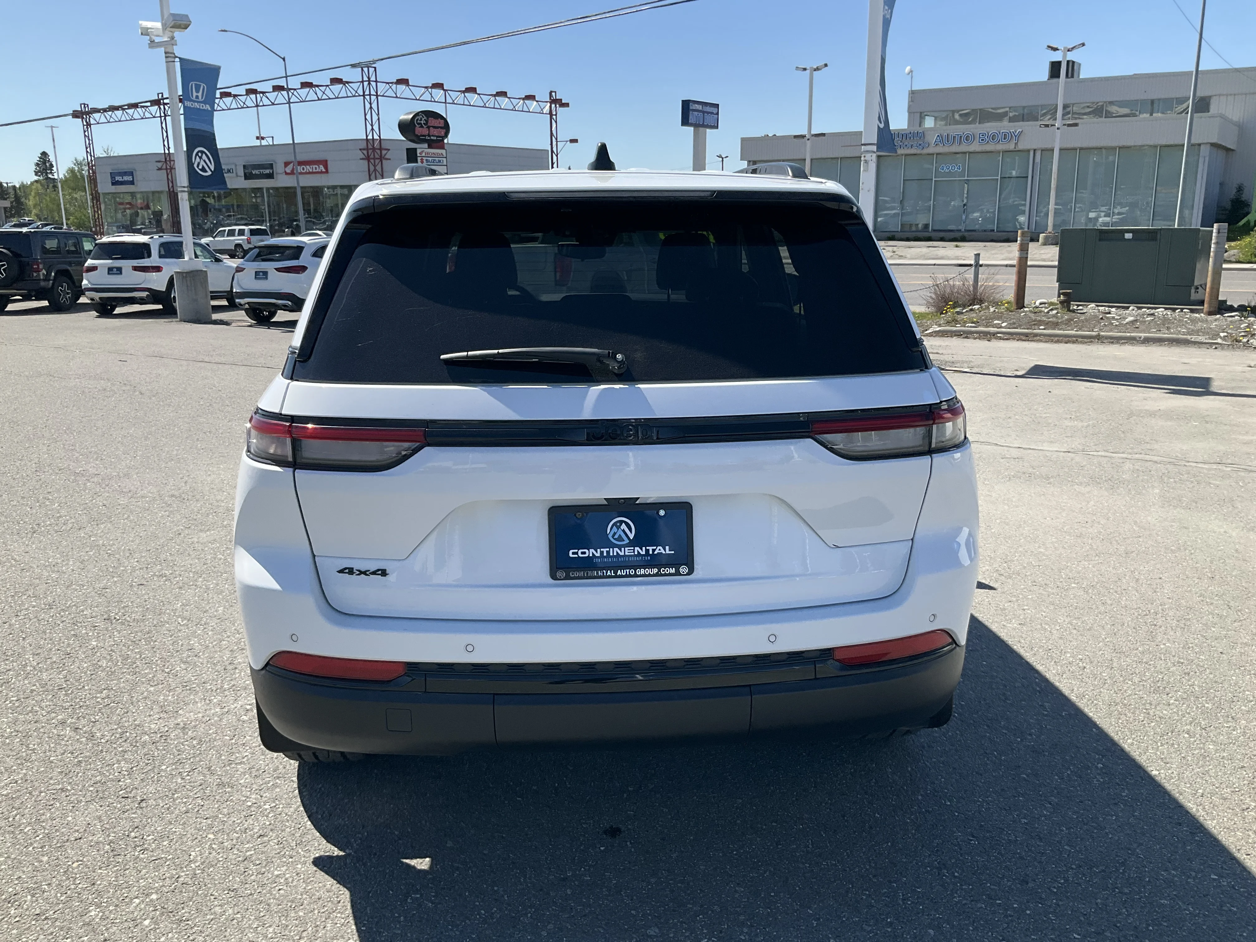 Used 2024 Bright White Jeep Altitude image 4