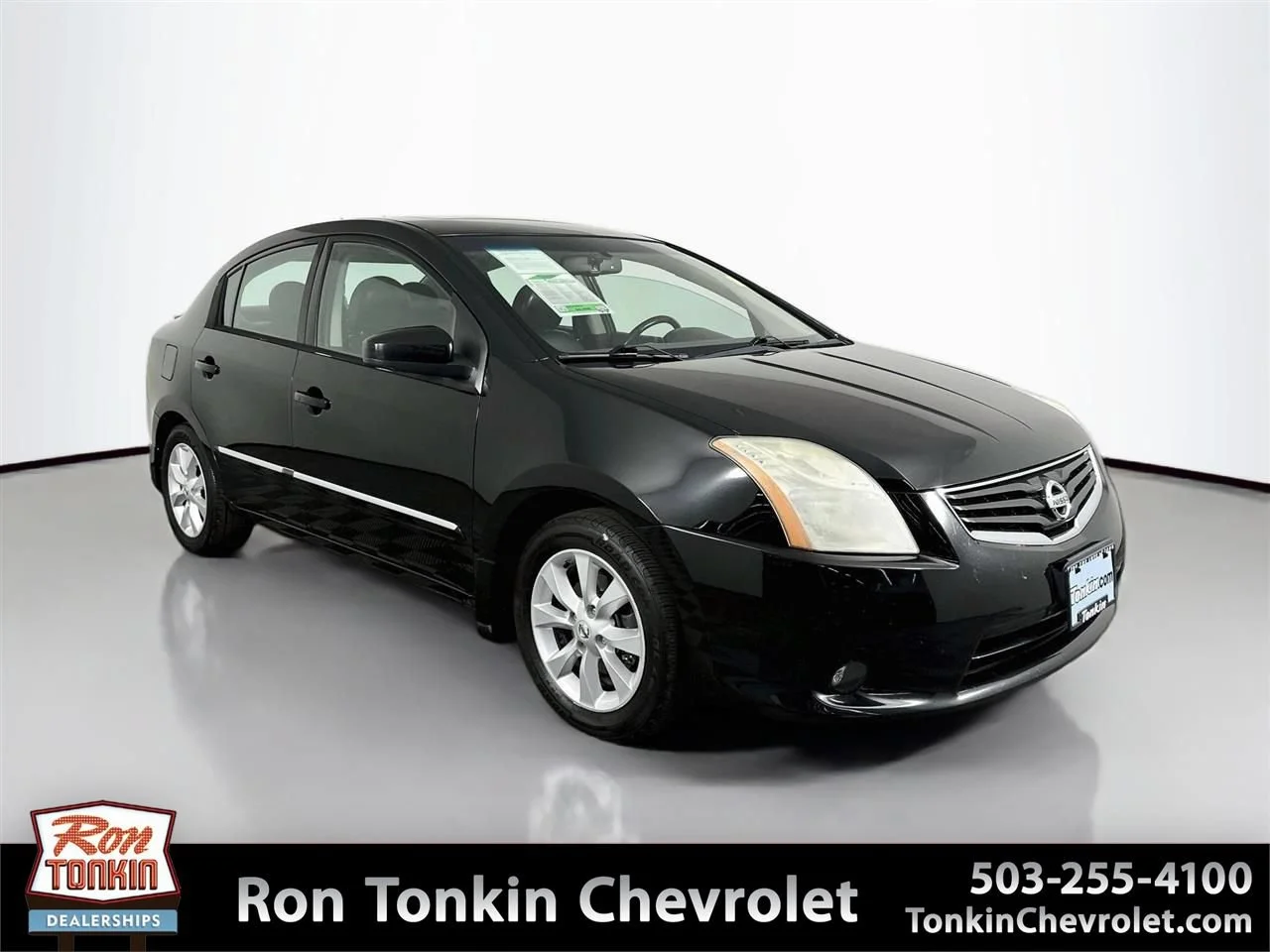 Used 2011 Black Nissan 2.0 SL image 1