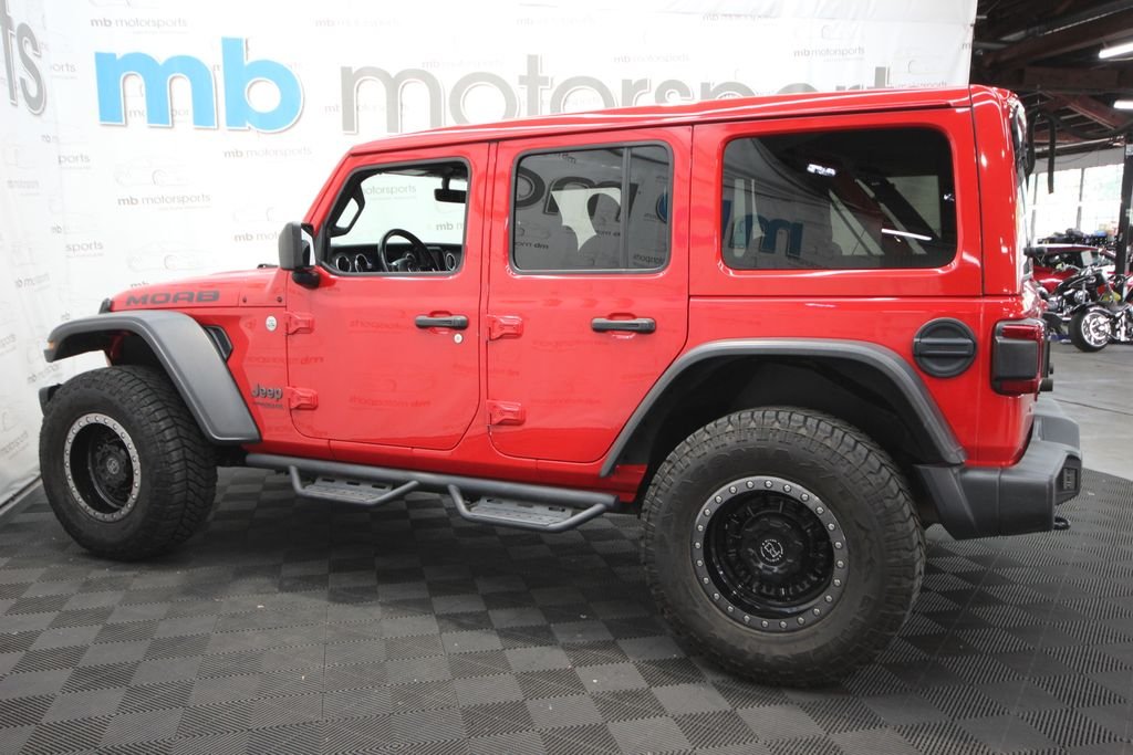 Used 2019 Red Jeep Unlimited Sahara image 3