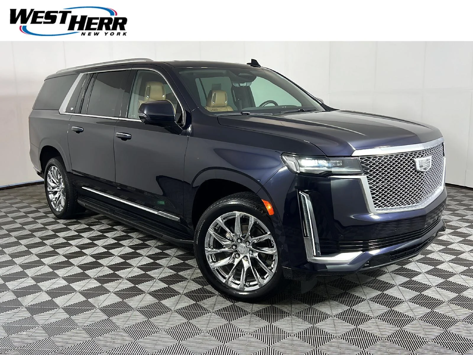 Used 2022 Dark Moon Blue Metallic Cadillac Premium Luxury image 1