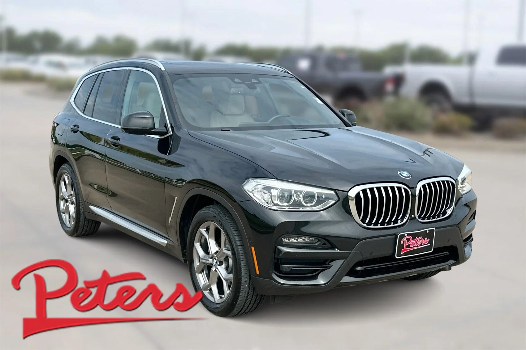 Used 2021 Black Sapphire Metallic BMW xDrive30i image 1