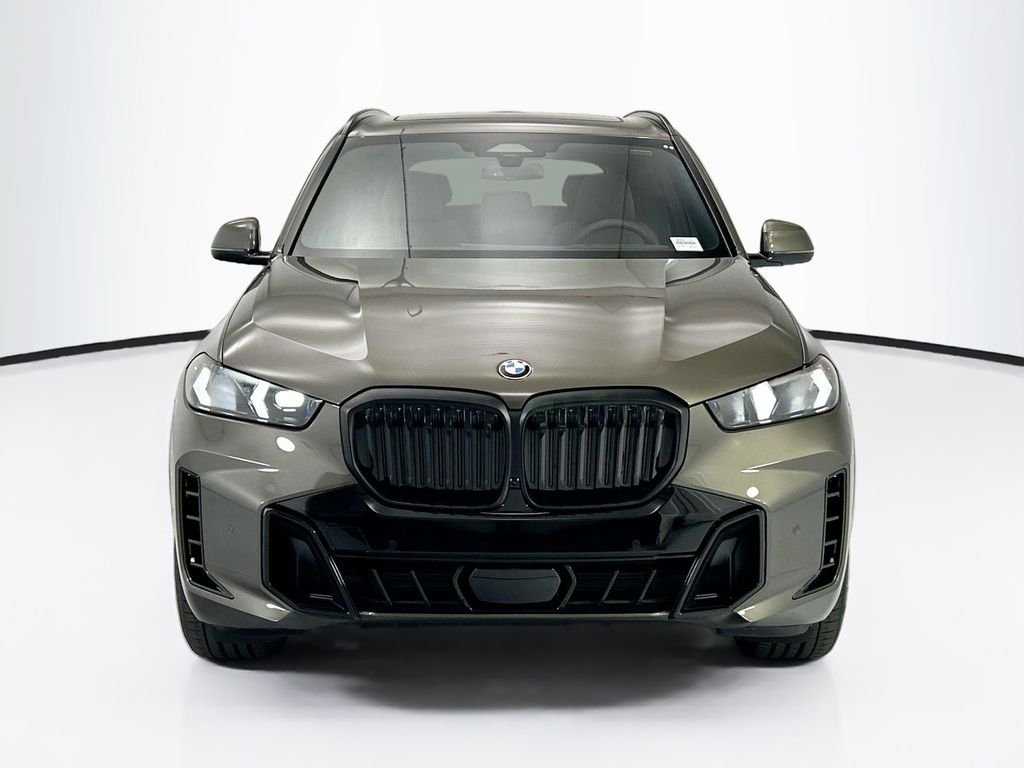 New 2026 Green Metallic BMW xDrive40i image 2