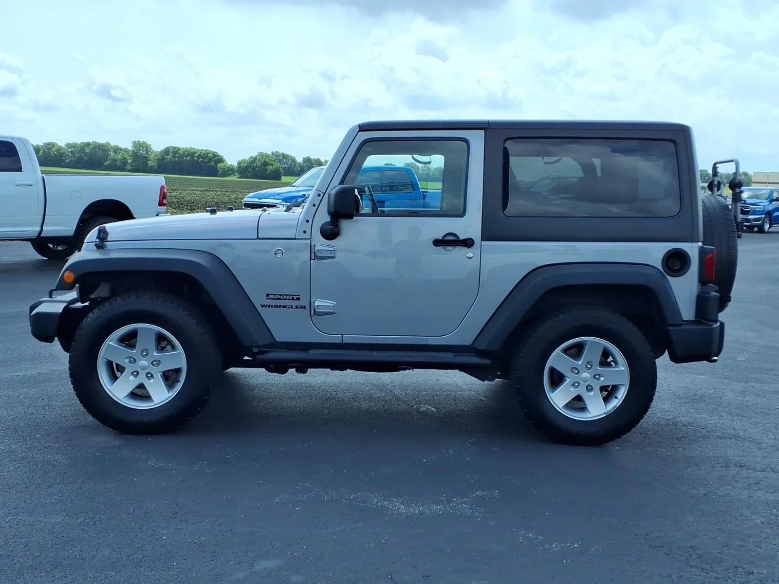 Used 2013 Billet Silver Metallic Clear Coat Jeep Sport image 11