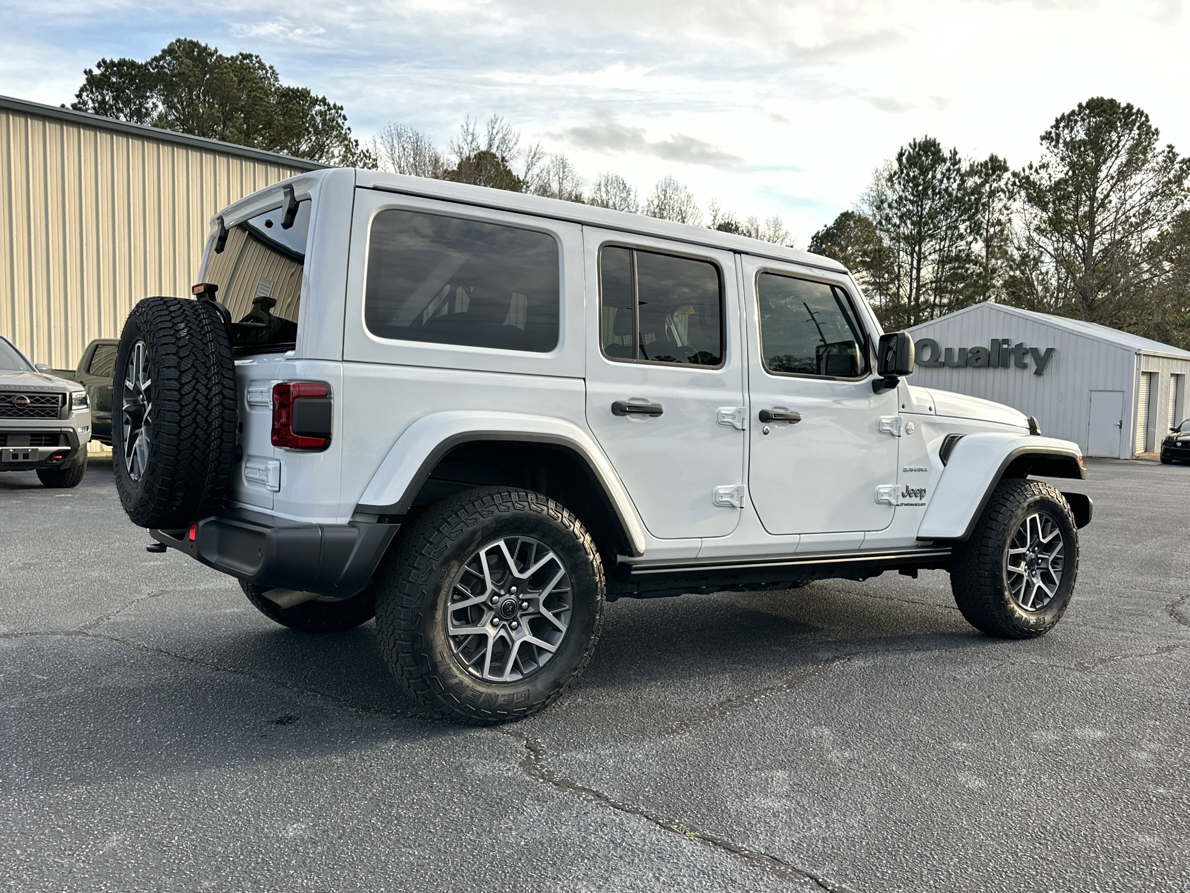 Used 2024 Bright White Clearcoat Jeep Sahara image 8