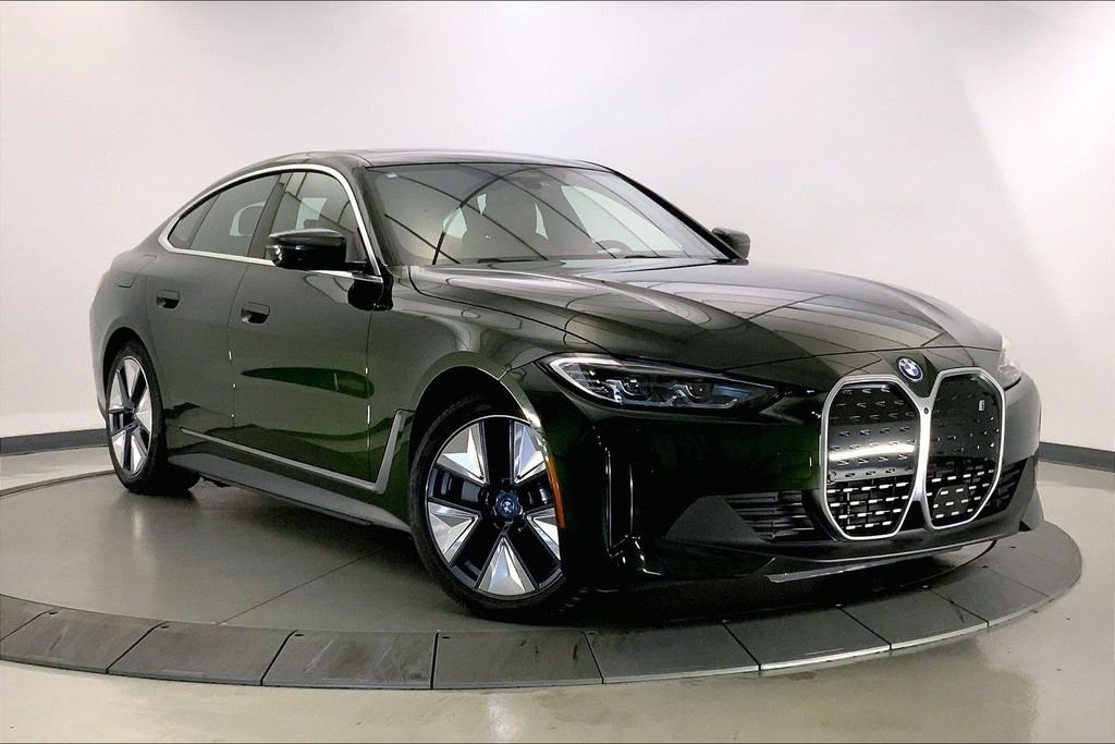 Certified Used 2023 Green Metallic BMW eDrive35 image 1