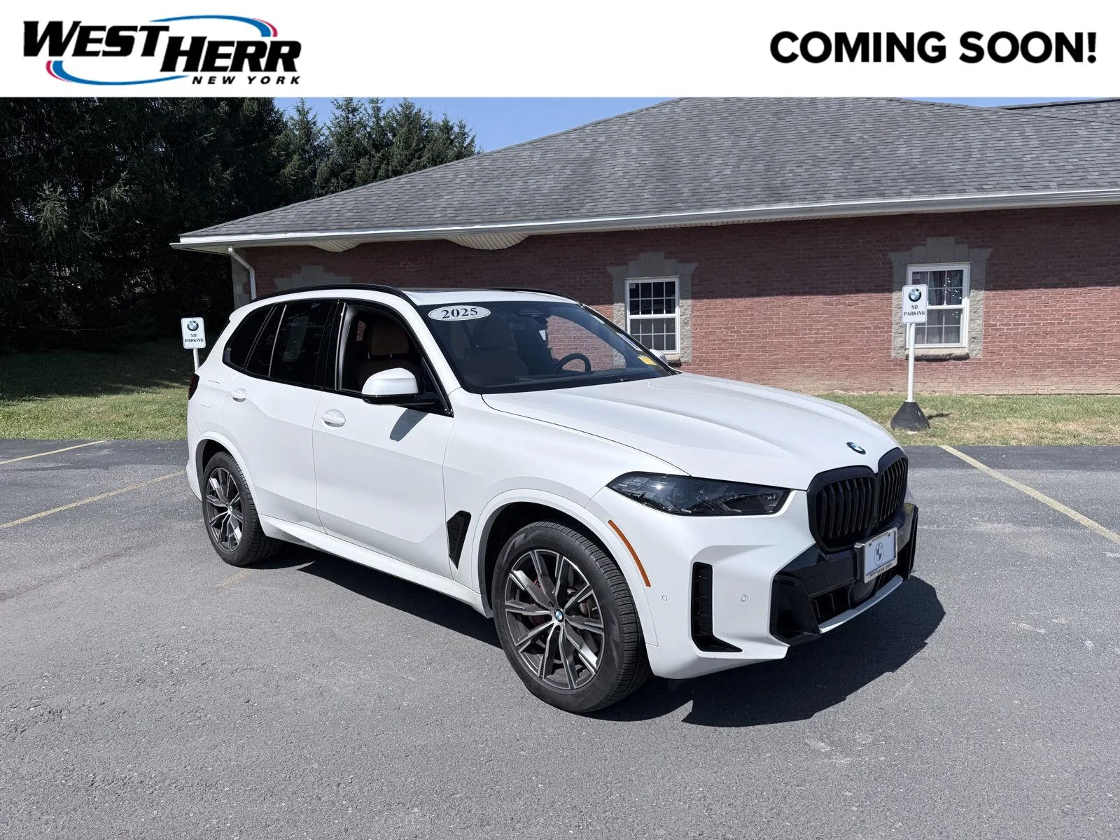 Used 2025 Mineral White Metallic BMW xDrive40i image 1
