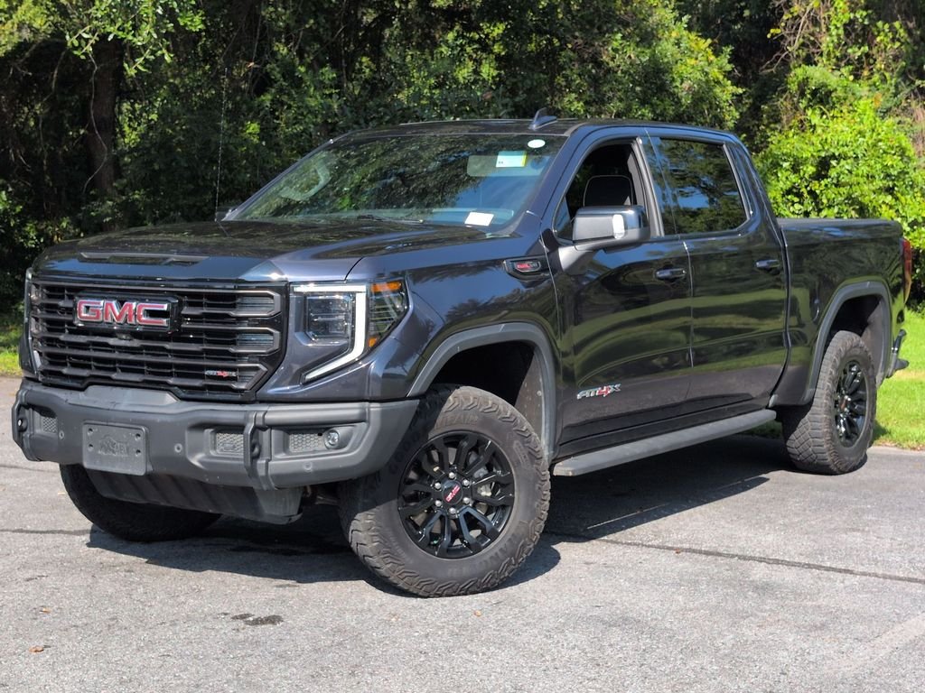 Used 2023 Silver GMC AT4X image 1