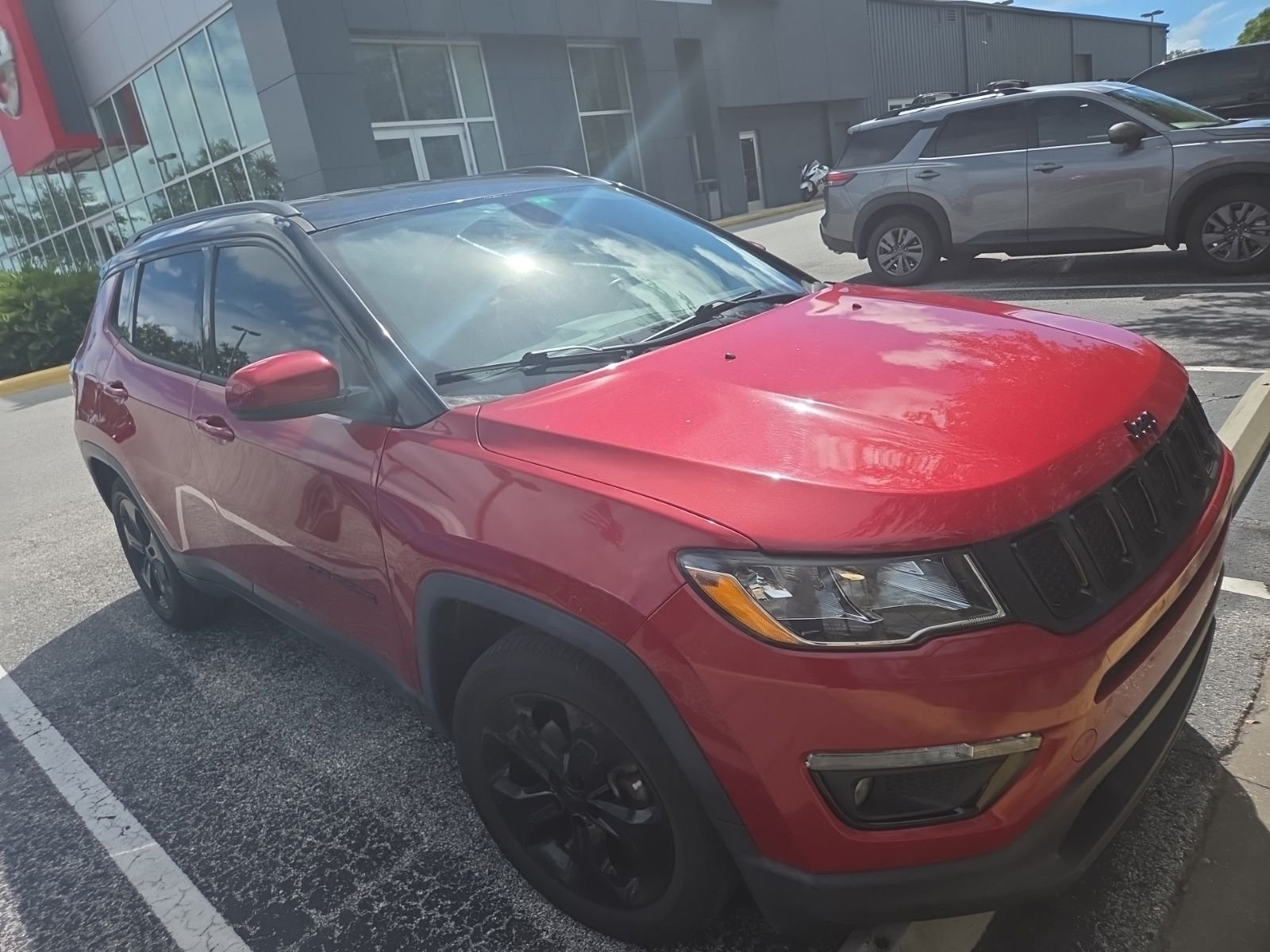 Used 2020 Red Jeep Latitude image 1