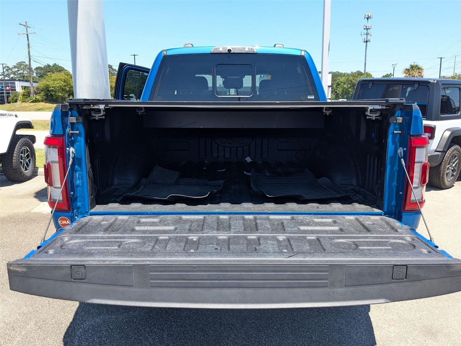 Used 2021 Velocity Blue Metallic Ford Raptor image 28