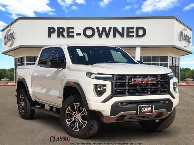 Summit White 2024 GMC Canyon AT4 Crew Cab 4WD Pickup Truck Four-Wheel Drive