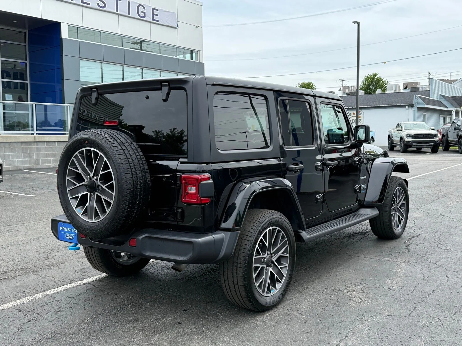Used 2023 Black Clearcoat Jeep Sahara 4xe image 14