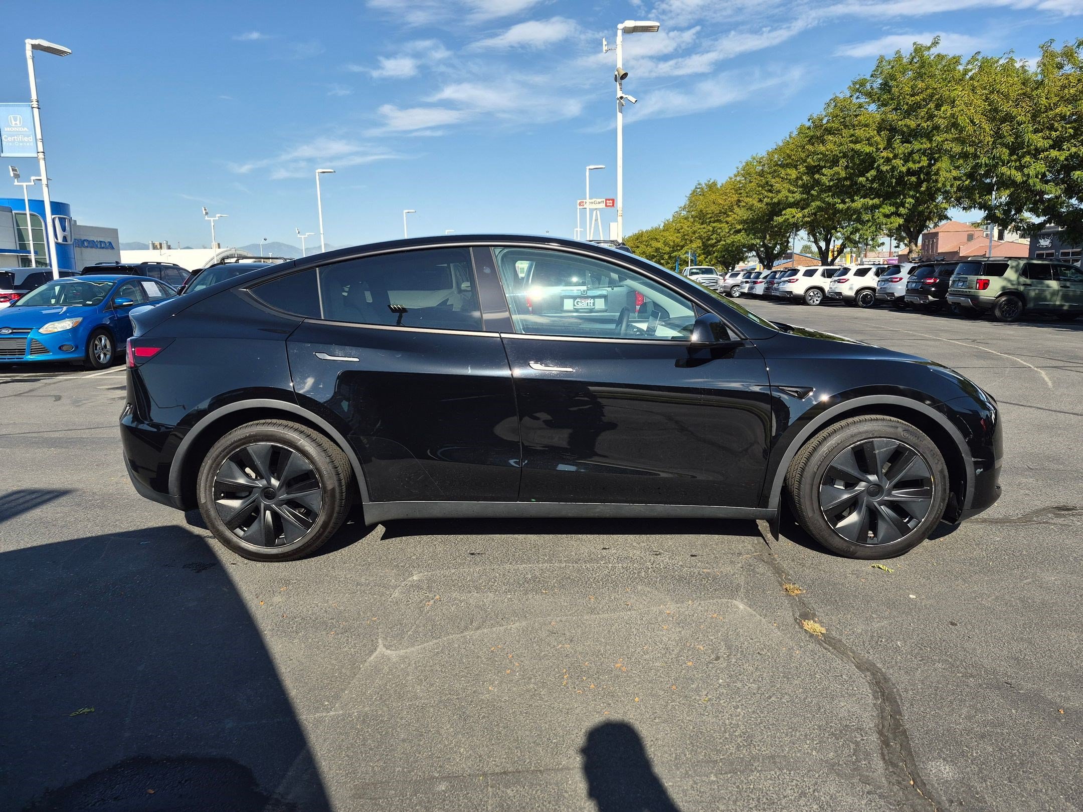 Used 2025 Tesla Model Y Long Range with VIN 7SAYGAEE6SF239035 for sale in Salt Lake City, UT