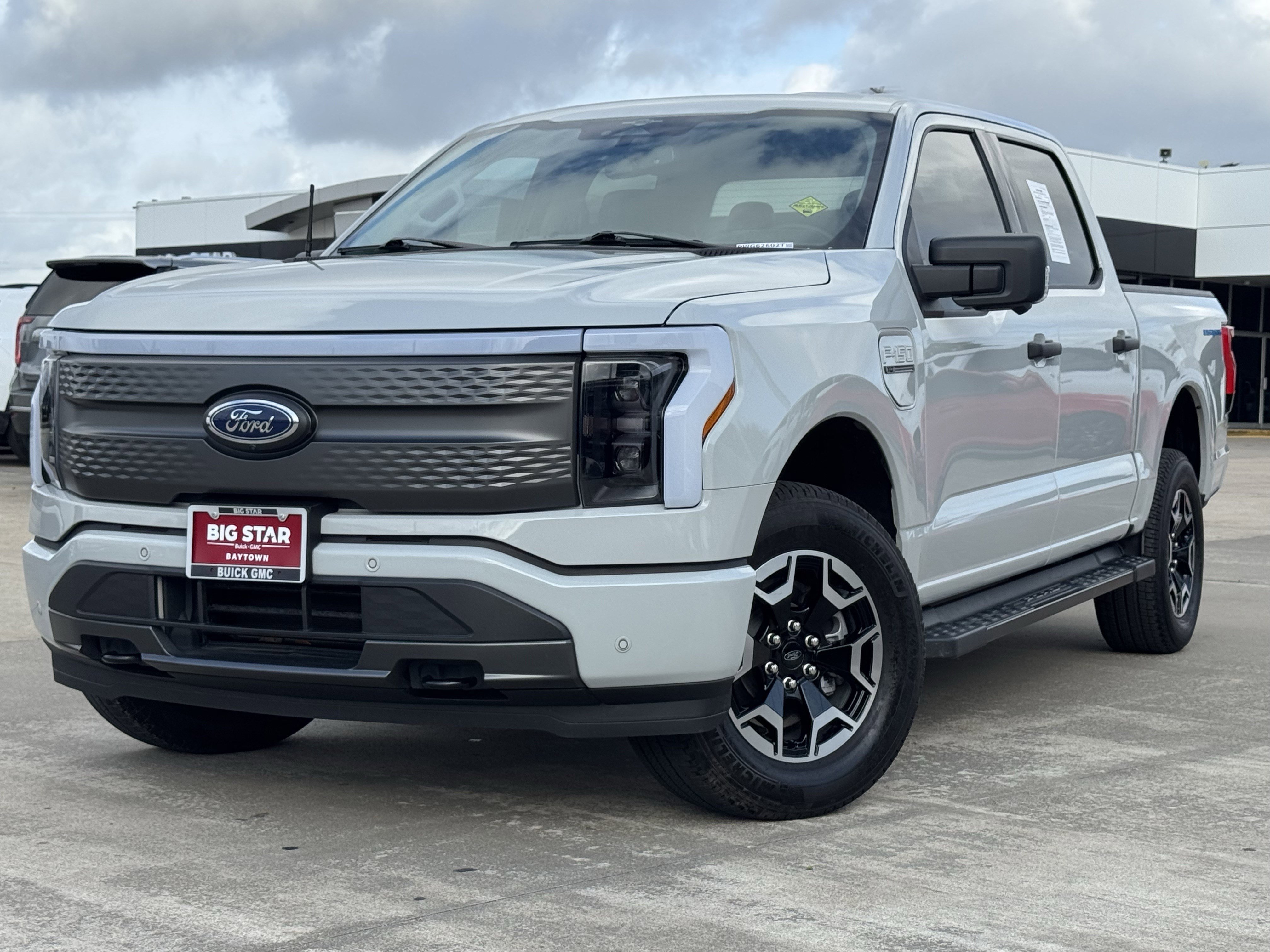 Used 2023 Ford F-150 Lightning XLT with VIN 1FTVW1EL9PWG62602 for sale in Baytown, TX