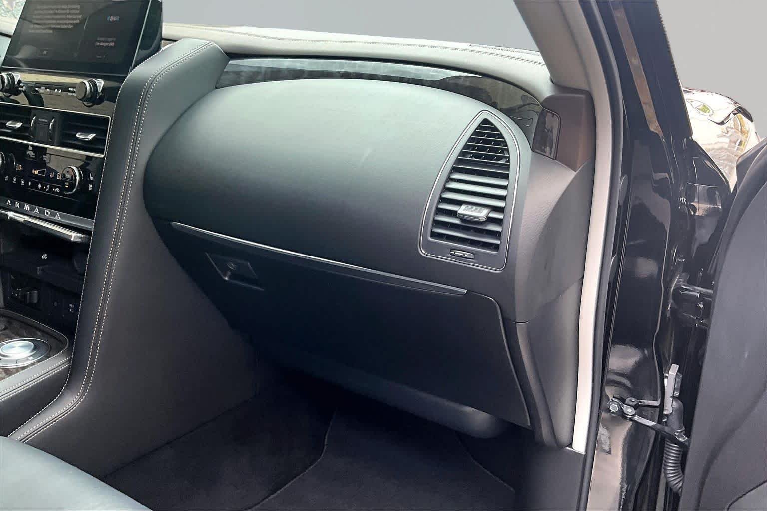 Used 2024 Super Black Nissan Platinum image 19