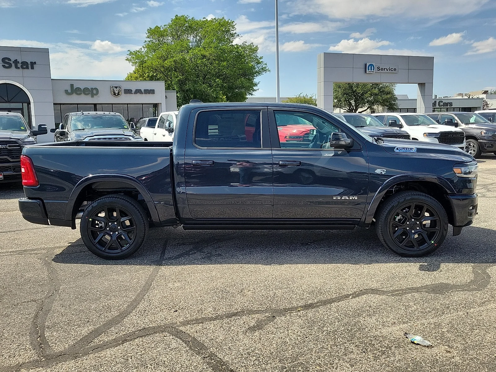 New 2026 Forged Blue Ram LARAMIE CREW CAB 4X4 5