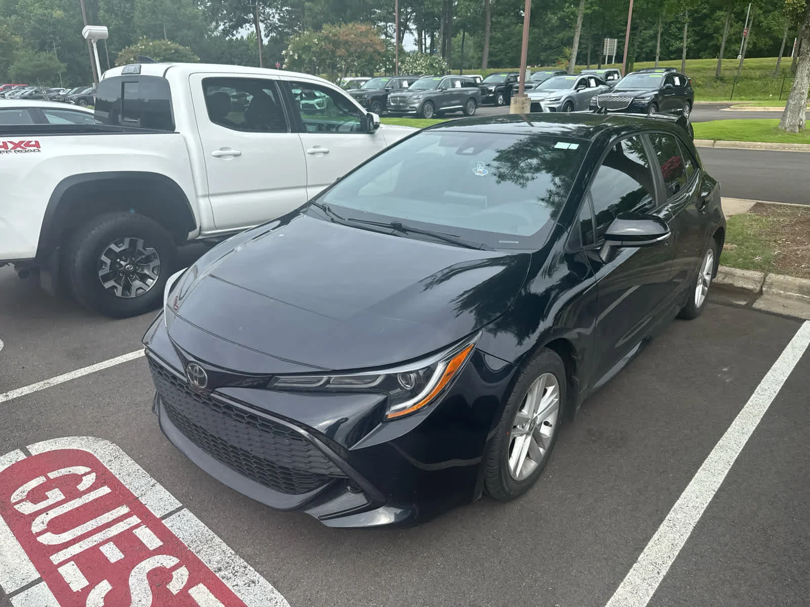 Used 2022 Midnight Black Metallic Toyota SE image 2
