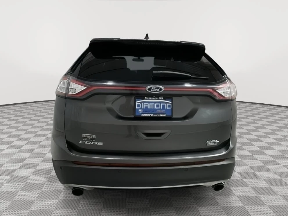 Used 2018 Magnetic Metallic Ford SEL image 4
