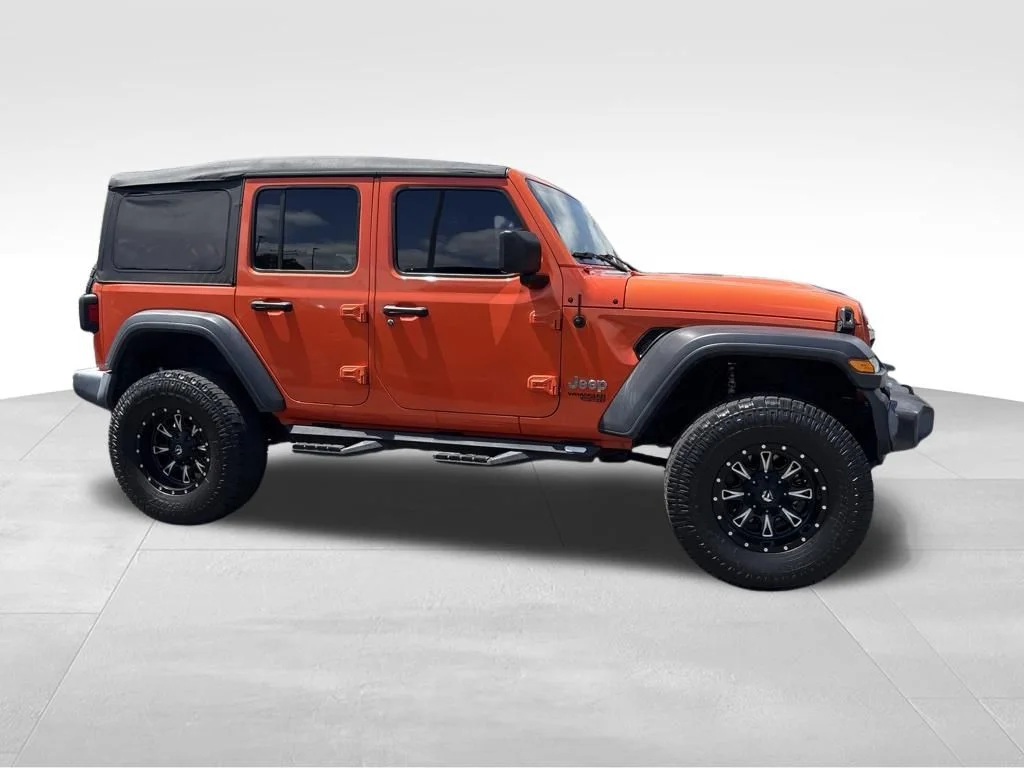 Used 2019 Orange Jeep Unlimited Sport image 11