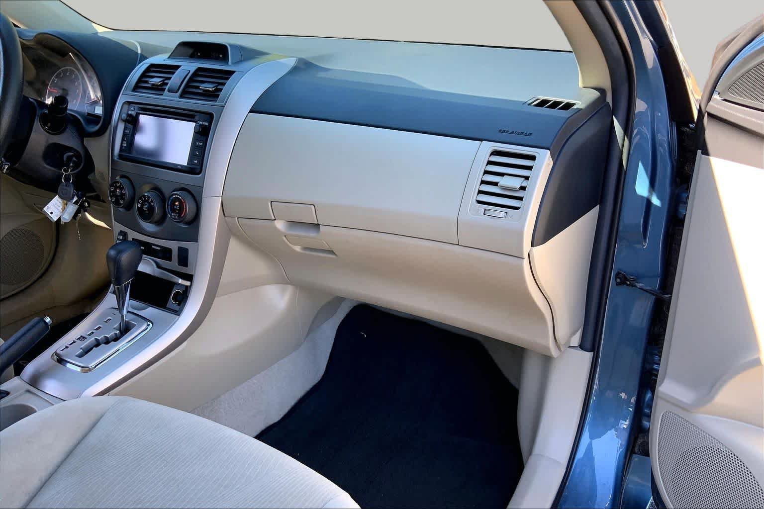 Used 2013 Tropical Sea Metallic Toyota LE image 19