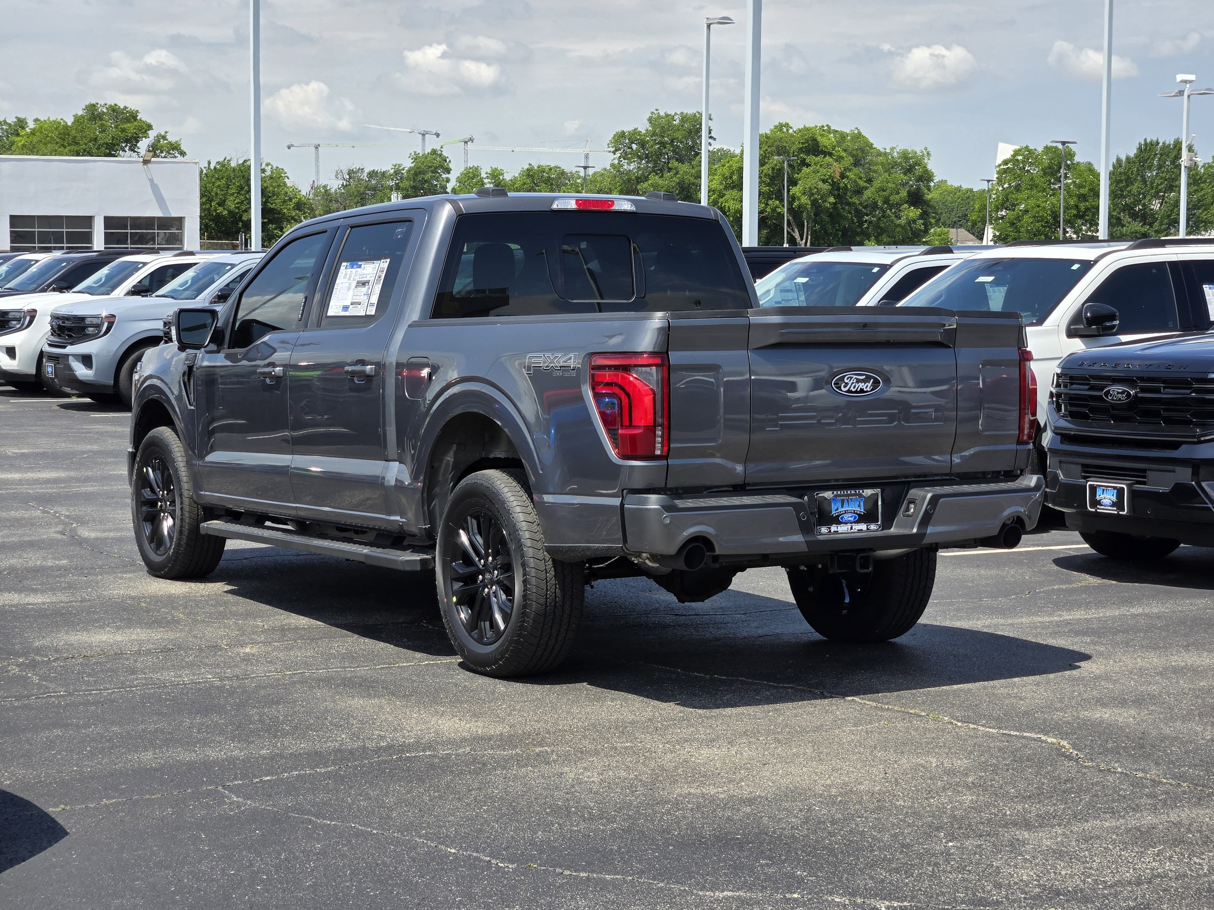 New 2026 Carbonized Gray Metallic Ford Lariat image 3