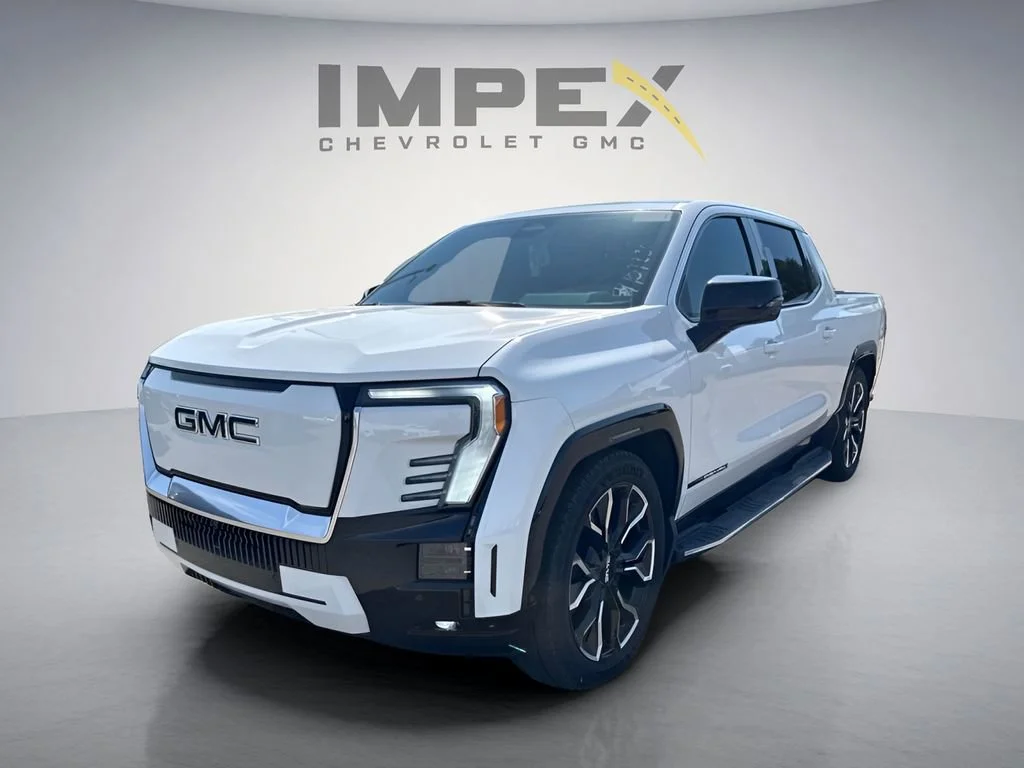 Used 2025 Summit White GMC Max Range Denali image 1
