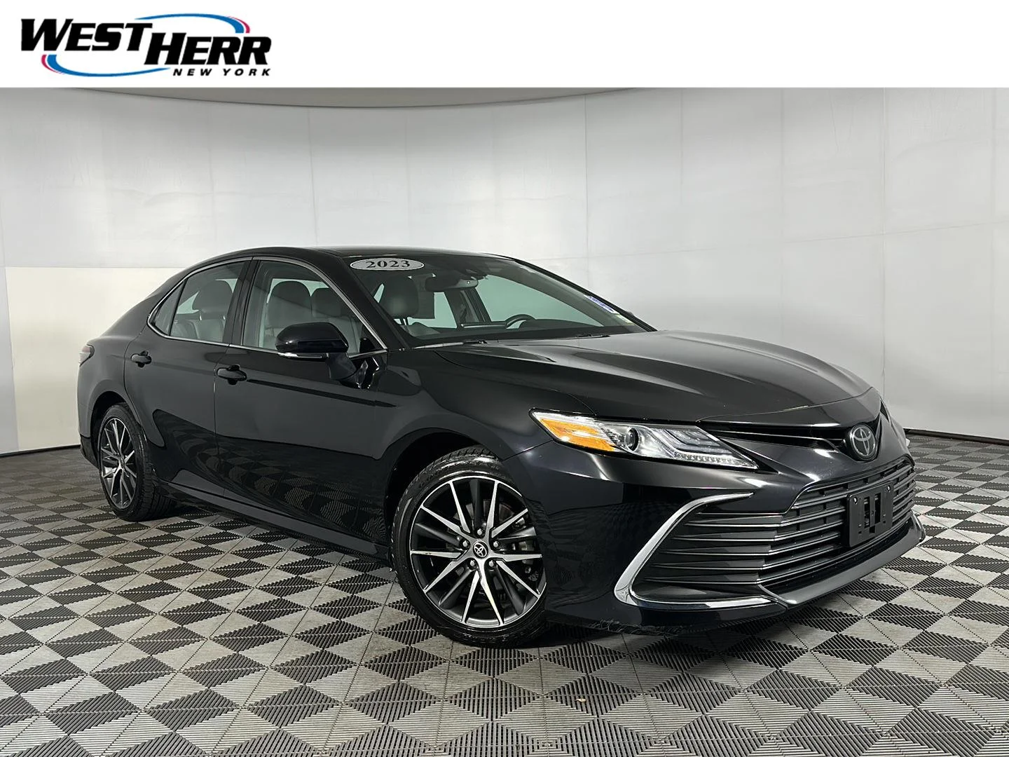 Used 2023 Midnight Black Metallic Toyota XLE image 1