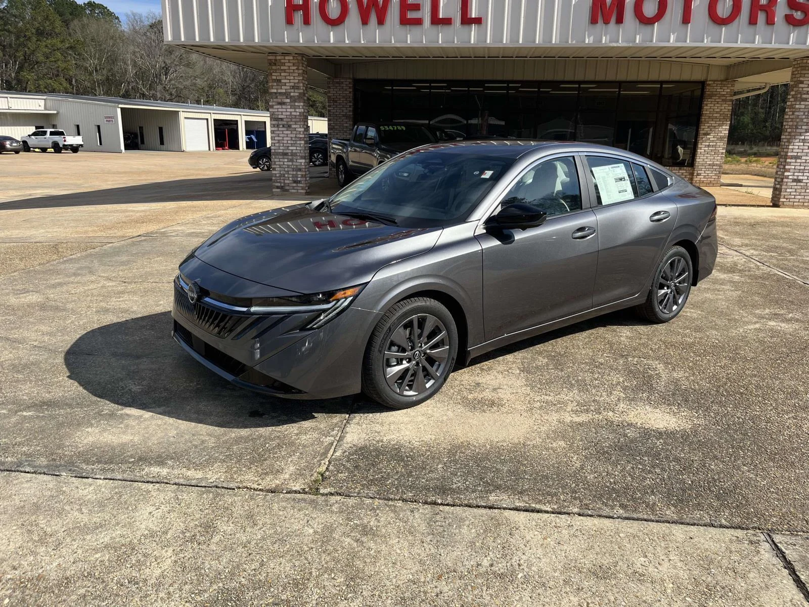 New 2026 Gun Metallic Nissan SL image 1