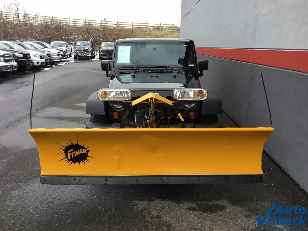 Used 2010 Black Jeep Unlimited Sport image 4