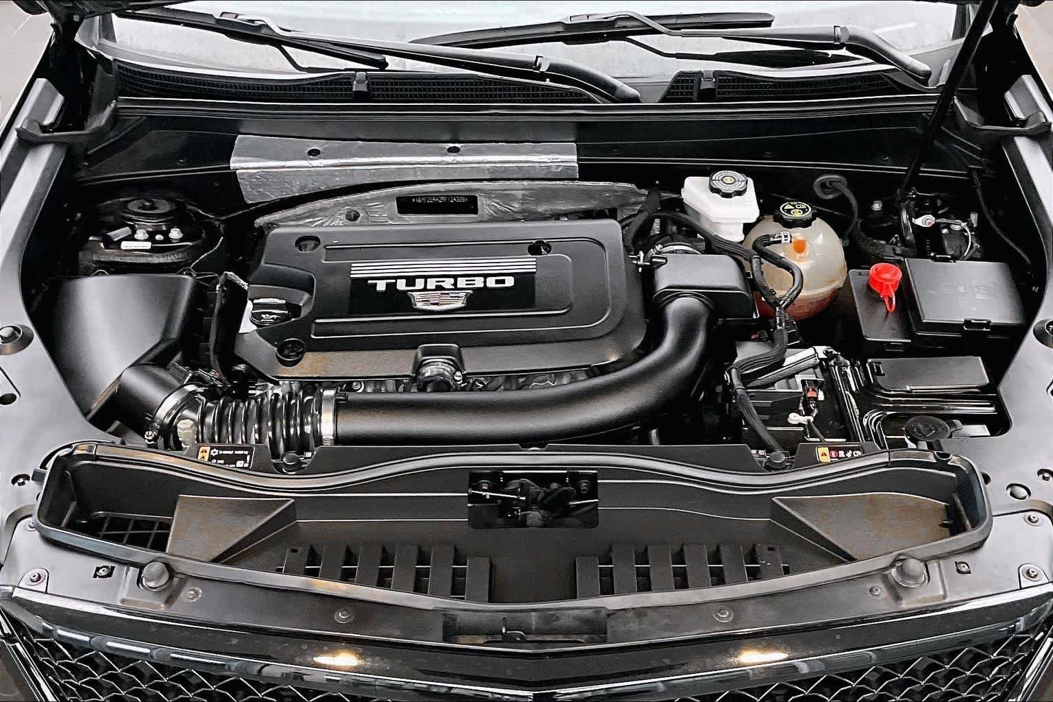 Used 2024 Stellar Black Metallic Cadillac FWD Sport image 30