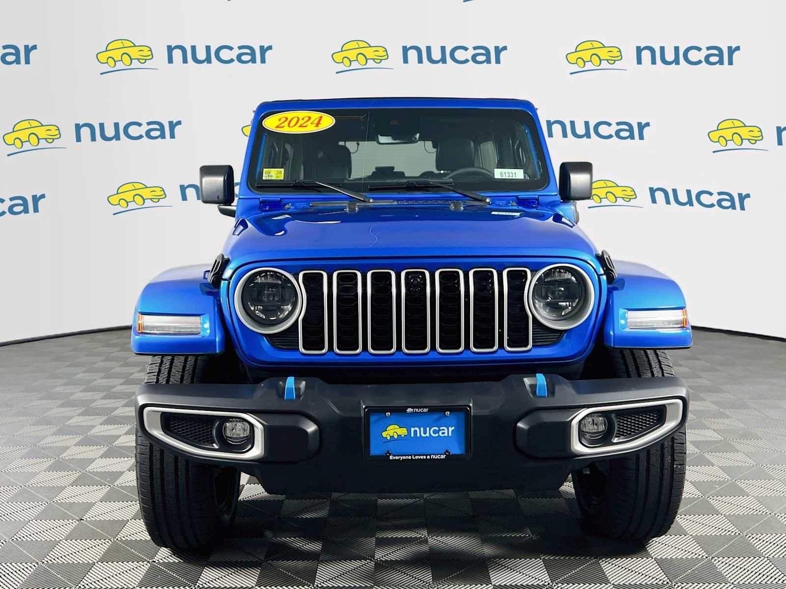 Used 2024 Hydro Blue Pearlcoat Jeep Sahara image 2