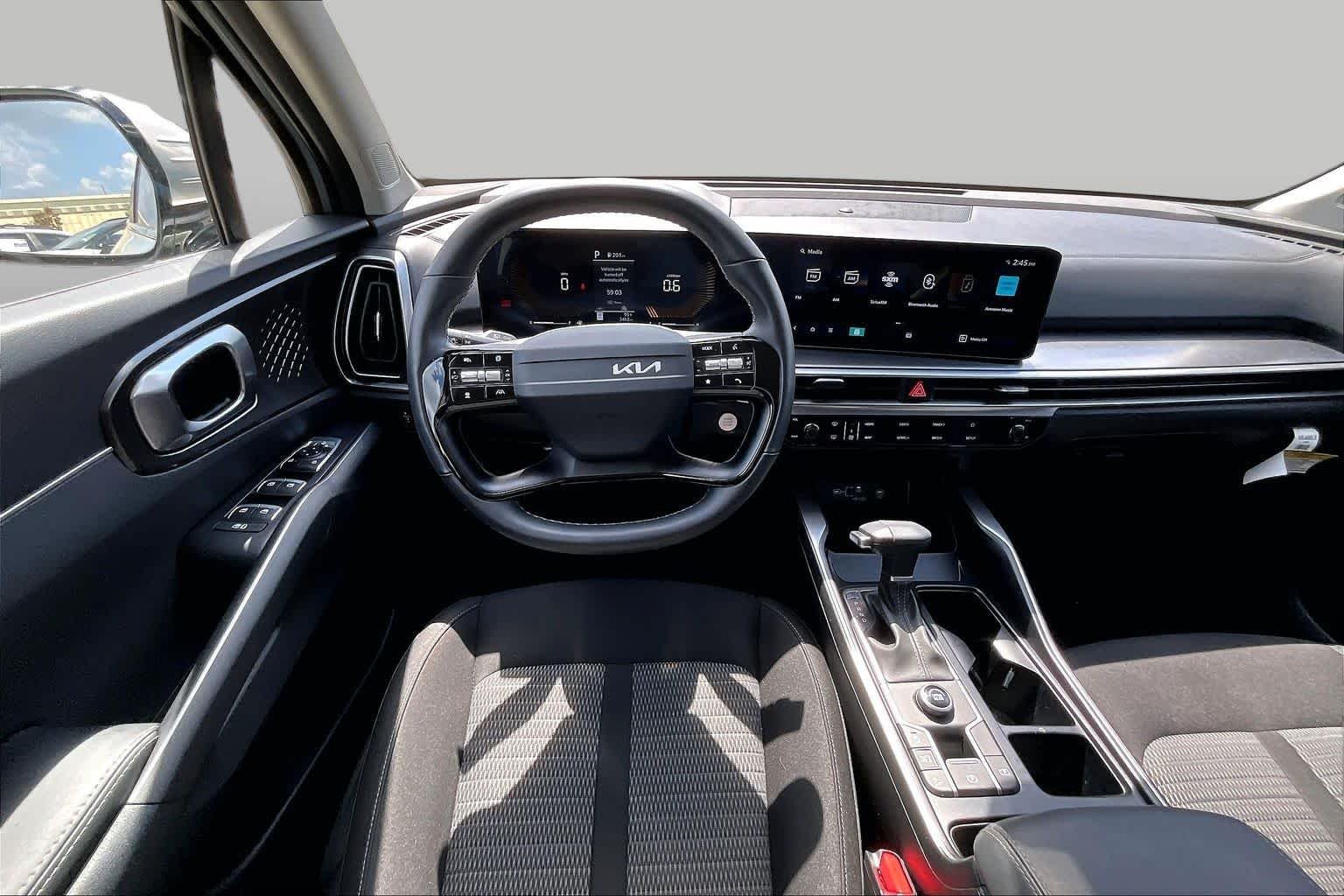 New 2026 Ivory Silver Kia LX image 6