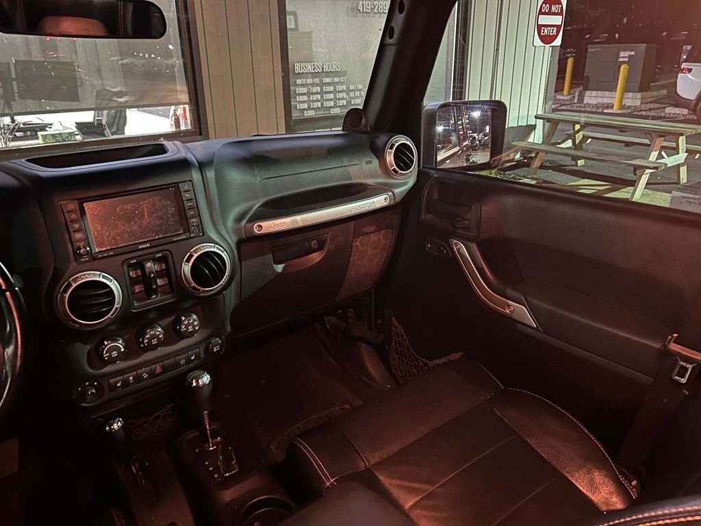 Used 2012 Black Jeep Unlimited Sahara image 7