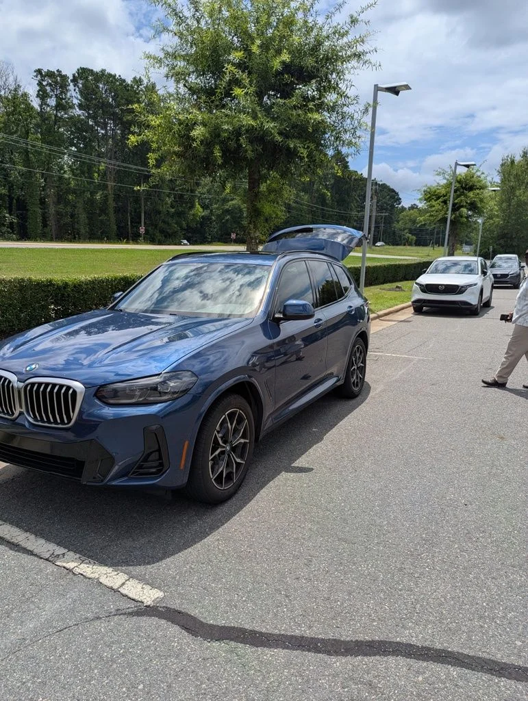 Used 2022 Blue Metallic BMW xDrive30i image 1