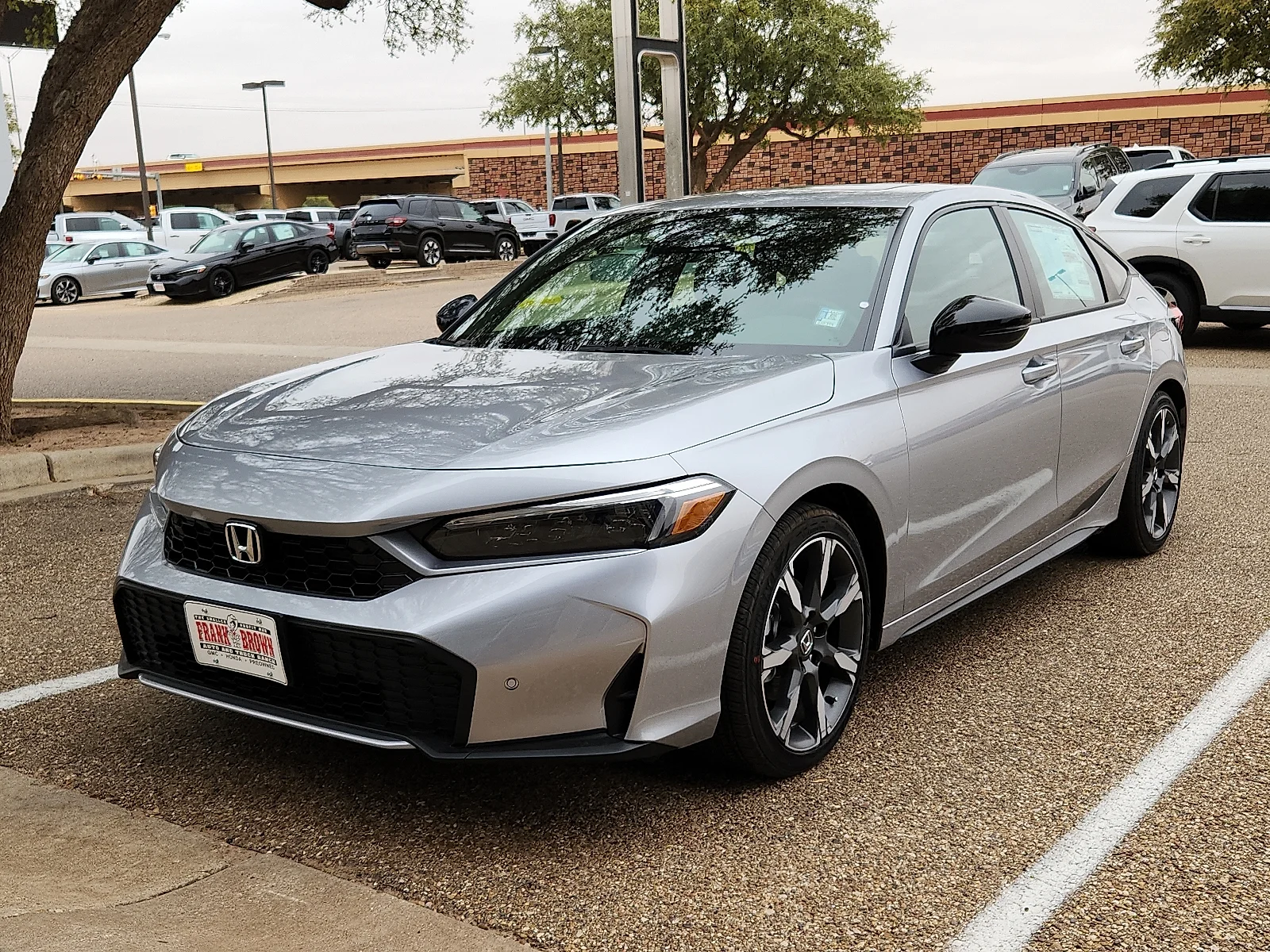 2026 Honda Civic Sport Touring Hybrid CVT's photo
